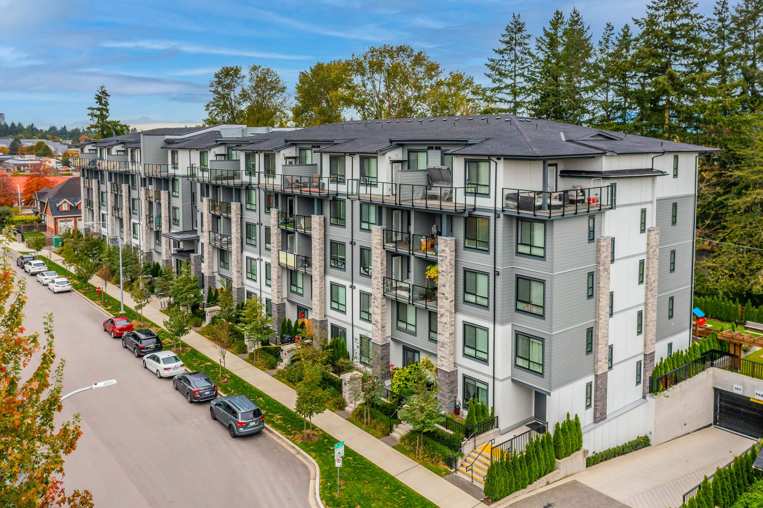 The “The Guildford” development is a condo and townhouse residential project in Surrey. Design by Group 161 | Barnett Dembek Architects.